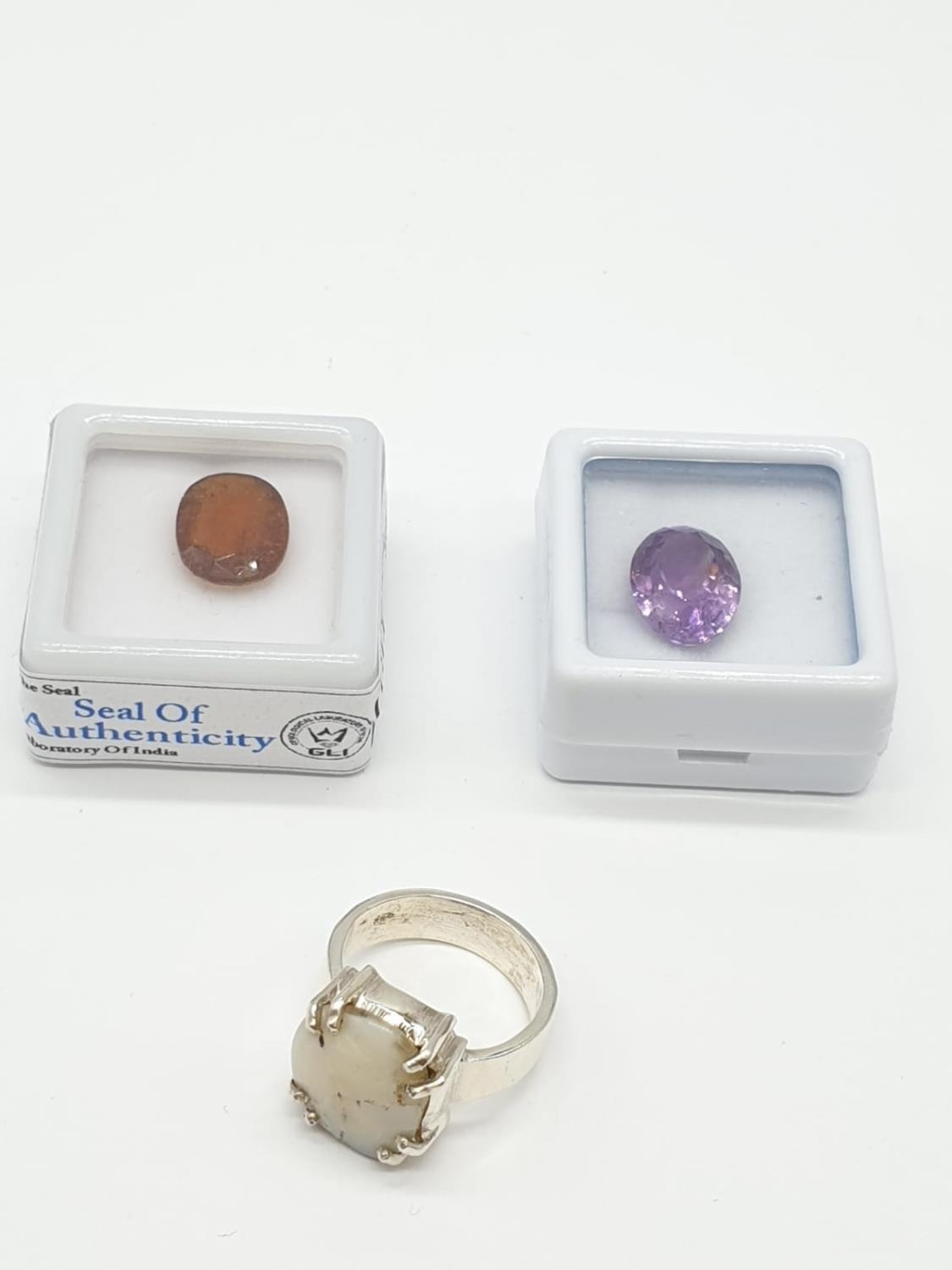 2 Gem Stones GLI CERTIFIED and a dressed silver Ring: 5.40ct natural amethyst 5.15ct natural