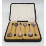 A set of 6 white metal coffee spoons in original box.
