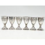 Six silver kiddish cups. Weight 157 grams, Each 7cm tall.