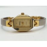 Vintage ladies wristwatch marked Gucci Goldtime having chrome and gold plated strap. Perfect working