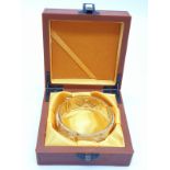 An Indian-Bollywood style gold filled bangle with laser pierced design. In a presentation box.