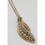 18ct gold diamond set pendant on chain, weight 3.69g and 40cm long, pendant 3 x 1cm