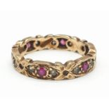 Vintage 9ct gold and ruby eternity ring. Full UK hallmark. Size L/ L and a half. Weight 2.7 grams.