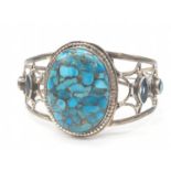 A Turquoise and Blue Topaz Gemstone Cuff bracelet in Sterling Silver, weight 29.6g and 6cm width