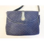 Vintage Gucci styled navy canvas crossbody bag. Leather strap and interior sipped pocket. Bag