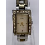 Ladies 'Guess' wristwatch. Square mother of pearl face with jewelled bezel quartz movement.