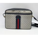 Gucci beige canvas messenger bag with navy leather trim and strap. Bag measurements, w29 x h21cm.