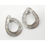Pair of large 18ct white gold and baguette cut diamond horse shoe earrings, weight 13.45g and 2.
