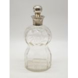 1912 Antique cut glass decanter with hall marked silver collar and stopper. 23cms high with a