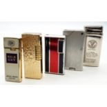 A selection of 5 vintage lighters.