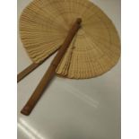 A hand made wooden circular fan from Madras, India. Circa 1900. 36cm open fan diameter. 28cm