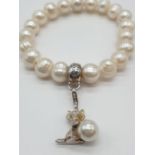 Thomas Sabo Pearl and Silver Bracelet, with Silver Cat charm. All pieces have the Thomas Sabo logo