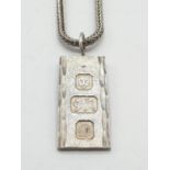 Miniature silver ingot pendant on 38cm long silver chain, weight 12.1g