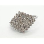 9ct white gold diamond cluster ring with 1ct of diamonds in total weighs 2.2g size L.