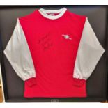 A signed Liam Brady, framed football shirt. (glass missing on frame).