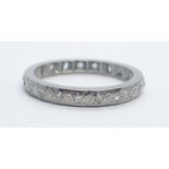 A platinum and diamond eternity ring. Weight 2.7g, size K.