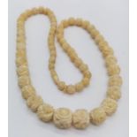 Late 19th Century hand crafted graduated ivory necklace 40.5g, 50cm long.