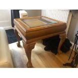 Large wooden occasional table with glass inlay. Bamboo-style base with decorated legs. 60x60cm.