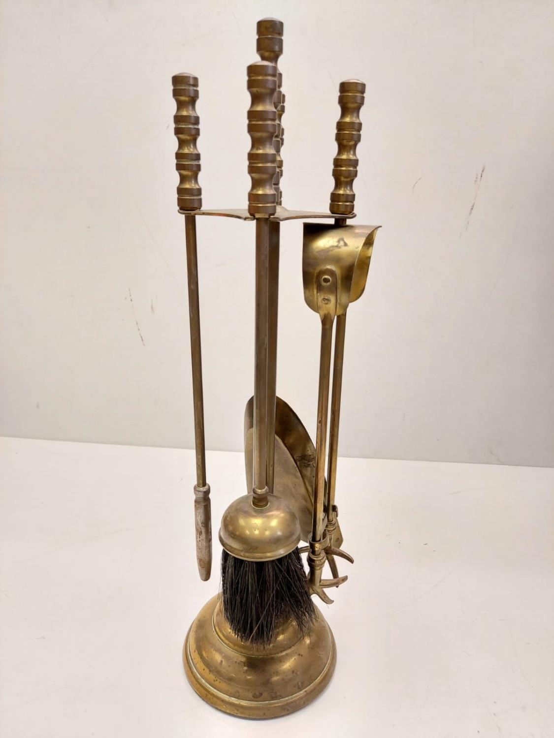 A bronze selection of vintage fireside utensils including decorated brass bellows. - Image 7 of 9