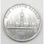 Silver 1939 Canadian 'Ottawa' dollar. Clear and raised definition to both sides. Slight nicks to