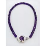 285cts amethyst necklace with amethyst gemstone clasp. 56.4 grams in weight. 44cm approx in length.