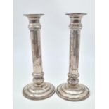 A Pair of Column Candle Stick. 925 Sliver. Weight:1.25kg. 20cm Height. 9cm Diameter at Base.