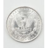 Silver 1883 Morgan dollar. New Orleans mint. Condition is brilliant plus, almost uncirculated.