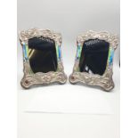 Two Vintage enamel silver picture frames, 15 x 21cm approx (2)