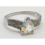 9ct white gold mystic topaz and diamond ring. Size M, Weight 2.24 grams.