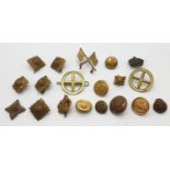 Selection of military braces to include buttons, shoulder pips, crossed flag, signal lens badge,