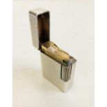 A vintage S.T Dupont silver plated lighter - needs gas and a flint.