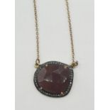 9ct Gold natural ruby and diamond necklace. 4.2g in weight, 40cm in length.