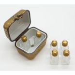 Gold & Rose patterned Limoges trinket box with six miniature perfume bottles.