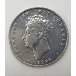 Silver George IV Shilling 1825. Extra fine condition. Scratch to neck shows under spotlight. Clear