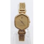 Vintage 18ct gold Audemars Piguet ladies watch with diamond encrusted bezel and shoulders, twisted