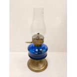 Vintage, blue glass oil lamp, with gold decor base and middle section. 34cm height.