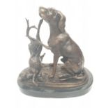 A vintage bronze sculpture of a hunting dog and an unlucky rabbit. 25 x 25 cm.