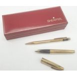 A late 70's American Sheaffer, gold electroplated, fountain pen and pen in original box. With