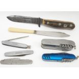 A collection of 7 vintage knives including a Mountaineer Trophy bone handled sheath knife, silver