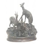 A vintage bronze sculpture of two deer, alert to the danger around them. 25 x 30 cm.