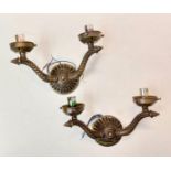 A pair of well decorated gilded wall lights with brass effect. Unused, as new.28 x 25cm