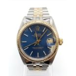 Rolex Oyster Perpetual Datejust watch, blue face with gold bezel, two tone strap, 31mm case