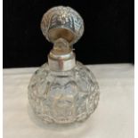 Antique silver topped cut glass scent bottle complete with original stopper in perfect condition,