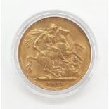 A King George V full gold sovereign dated 1911. London mint. 8 grams in weight.