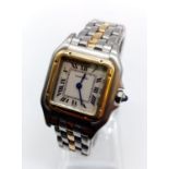 Cartier two tone ladies tank watch, square case (22mm) and Roman numerals, 11202 C34603