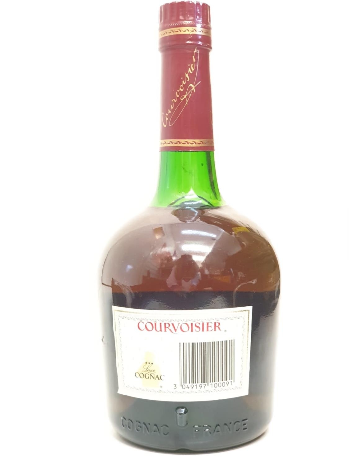 A bottle of vintage Courvoisier cognac. - Image 2 of 8