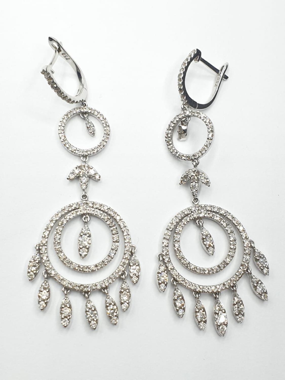 Pair of 18ct white gold and diamond drop earrings in the shape of dream catchers, weight 15.82g