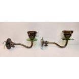 A pair of brass wall lights with green reflectors. Manufactured by The Great British Lighting
