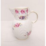 Coalport Caughley mask head jug with floral design, 13cm tall