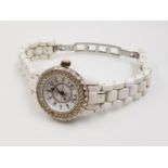 A Chanel 112 styled swiss made ladies watch - white ceramic bracelet. As found.